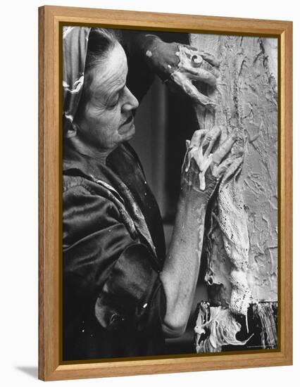 English Sculptor, Barbara Hepworth, at Work in Her Studio-Paul Schutzer-Framed Premier Image Canvas