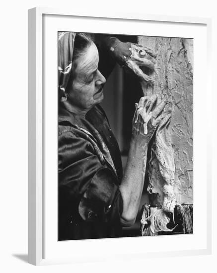 English Sculptor, Barbara Hepworth, at Work in Her Studio-Paul Schutzer-Framed Premium Photographic Print