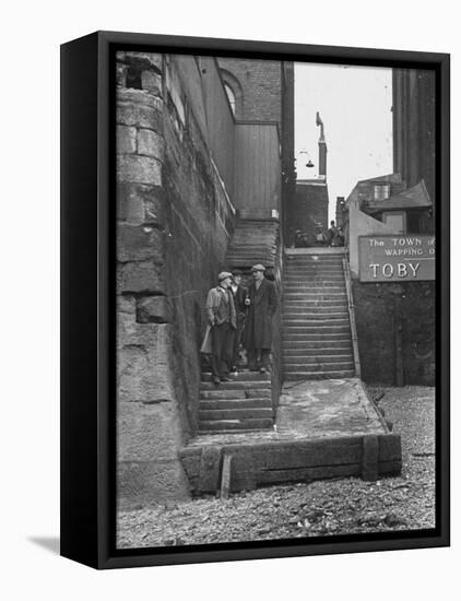 Englishmen Chatting as They Stand on Wapping Old Stairs Which Is a Great Thames Landmark-Carl Mydans-Framed Premier Image Canvas