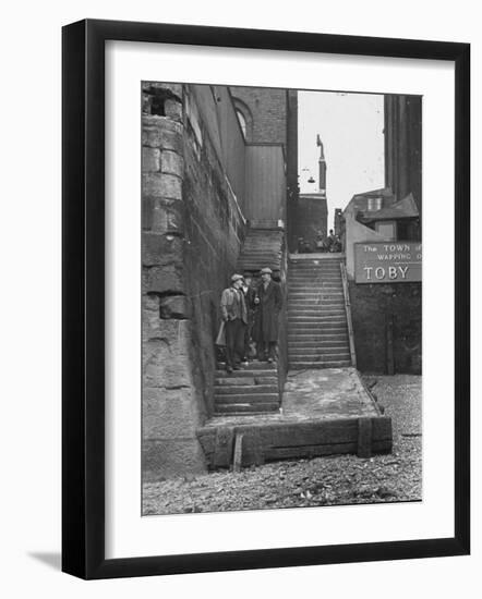 Englishmen Chatting as They Stand on Wapping Old Stairs Which Is a Great Thames Landmark-Carl Mydans-Framed Photographic Print