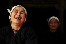 Two Dong Women, One Laughing, in a Dark Room, Sanjiang Dong Village, Guangxi, China-Enrique Lopez-Tapia-Photographic Print