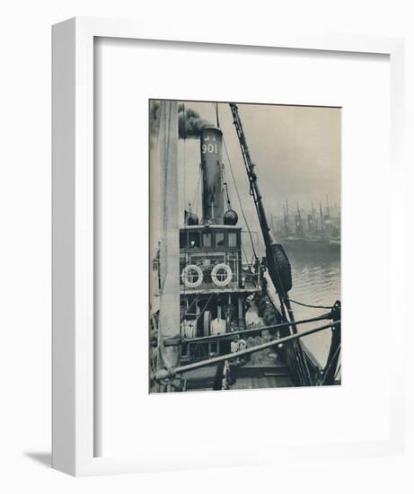 'Entering Grimsby Docks at the end of a North Sea voyage is the fishing vessel Saurian', 1937-Unknown-Framed Photographic Print