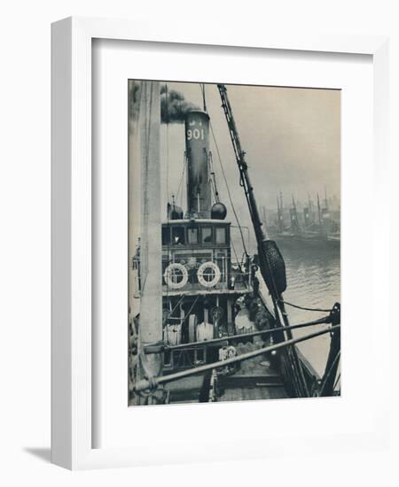 'Entering Grimsby Docks at the end of a North Sea voyage is the fishing vessel Saurian', 1937-Unknown-Framed Photographic Print