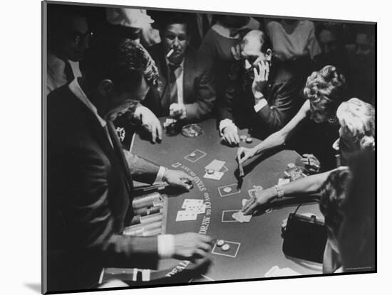 Entertainer Dean Martin Running His Own Game of Blackjack at a Casino-Allan Grant-Mounted Premium Photographic Print