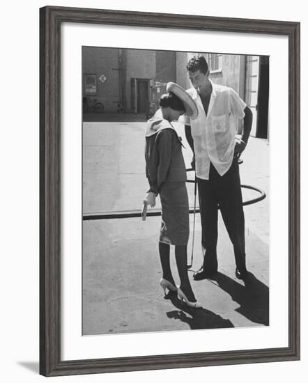 Entertainer Dean Martin Talking with Actress Pier Angeli on the Lot of a Studio-Allan Grant-Framed Premium Photographic Print