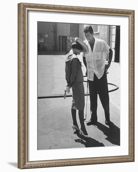 Entertainer Dean Martin Talking with Actress Pier Angeli on the Lot of a Studio-Allan Grant-Framed Premium Photographic Print