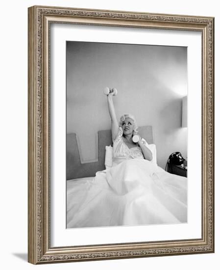 Entertainer Mae West Lifitng Barbells in Bed-Loomis Dean-Framed Photographic Print