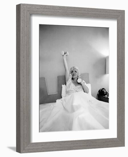 Entertainer Mae West Lifitng Barbells in Bed-Loomis Dean-Framed Photographic Print