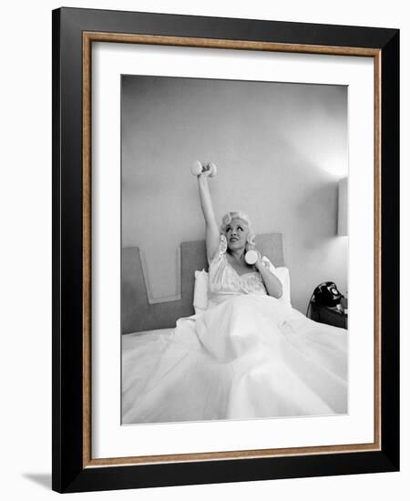 Entertainer Mae West Lifitng Barbells in Bed-Loomis Dean-Framed Photographic Print