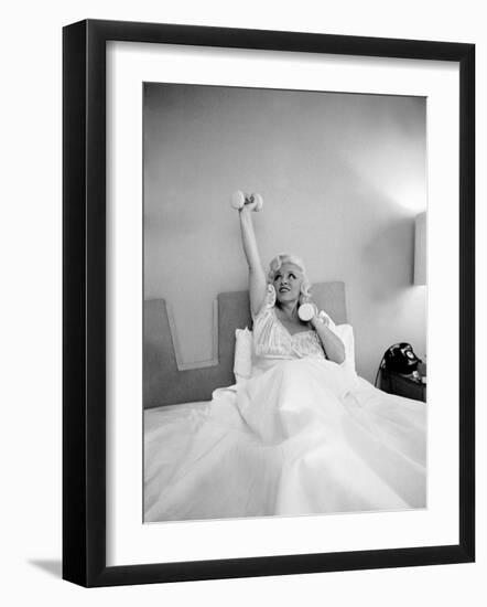 Entertainer Mae West Lifitng Barbells in Bed-Loomis Dean-Framed Photographic Print