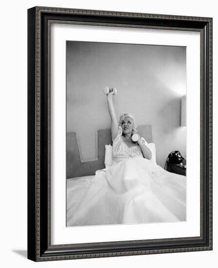 Entertainer Mae West Lifitng Barbells in Bed-Loomis Dean-Framed Photographic Print