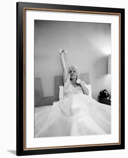 Entertainer Mae West Lifitng Barbells in Bed-Loomis Dean-Framed Photographic Print