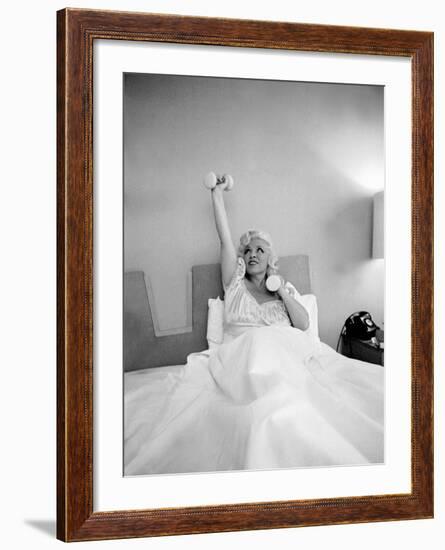 Entertainer Mae West Lifitng Barbells in Bed-Loomis Dean-Framed Photographic Print