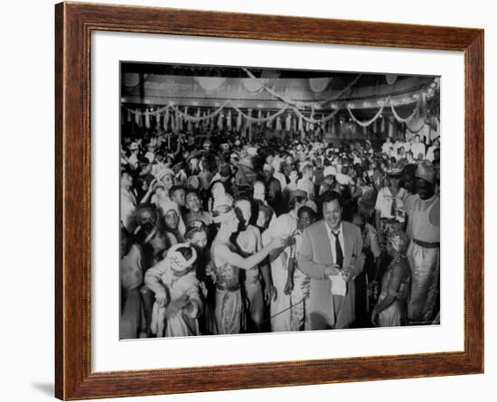 Entertainer Orson Welles Attending the Rio de Janerio Carnival Celebration-Hart Preston-Framed Premium Photographic Print