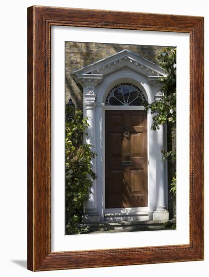 Entrance into a House with Grand Door with Window Lights, Surrounded by Vegetation-Natalie Tepper-Framed Photo