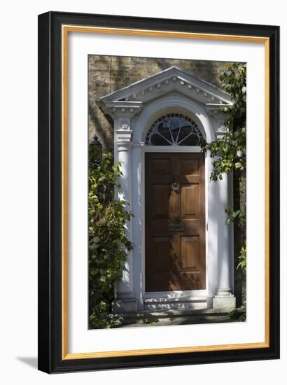 Entrance into a House with Grand Door with Window Lights, Surrounded by Vegetation-Natalie Tepper-Framed Photo