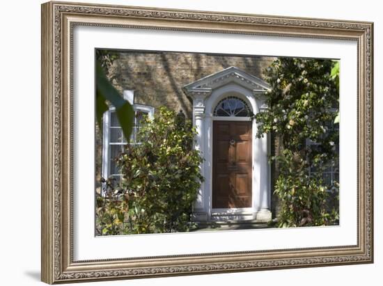 Entrance into a House with Grand Door with Window Lights, Surrounded by Vegetation-Natalie Tepper-Framed Photo