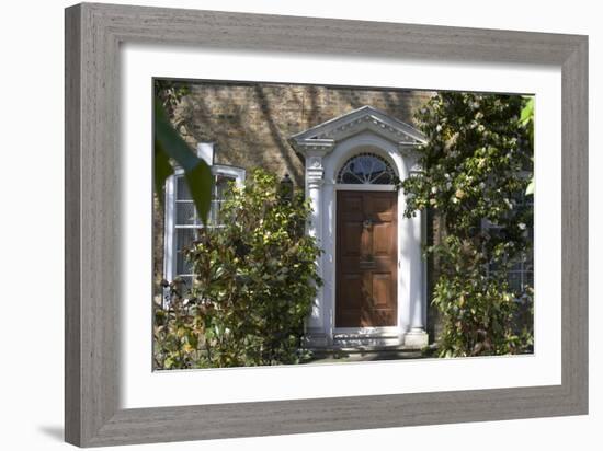 Entrance into a House with Grand Door with Window Lights, Surrounded by Vegetation-Natalie Tepper-Framed Photo