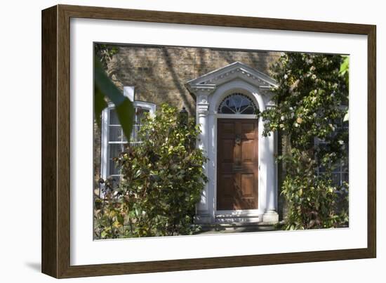 Entrance into a House with Grand Door with Window Lights, Surrounded by Vegetation-Natalie Tepper-Framed Photo