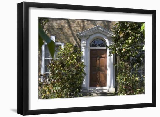 Entrance into a House with Grand Door with Window Lights, Surrounded by Vegetation-Natalie Tepper-Framed Photo