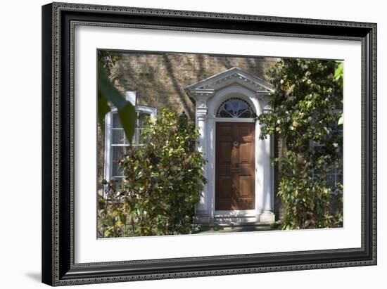 Entrance into a House with Grand Door with Window Lights, Surrounded by Vegetation-Natalie Tepper-Framed Photo