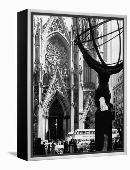 Entrance to St. Patrick's Visible Across Fifth Avenue, with Atlas Statue Silhouetted in Foreground-Andreas Feininger-Framed Premier Image Canvas