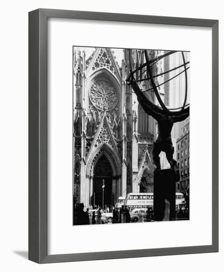 Entrance to St. Patrick's Visible Across Fifth Avenue, with Atlas Statue Silhouetted in Foreground-Andreas Feininger-Framed Photographic Print