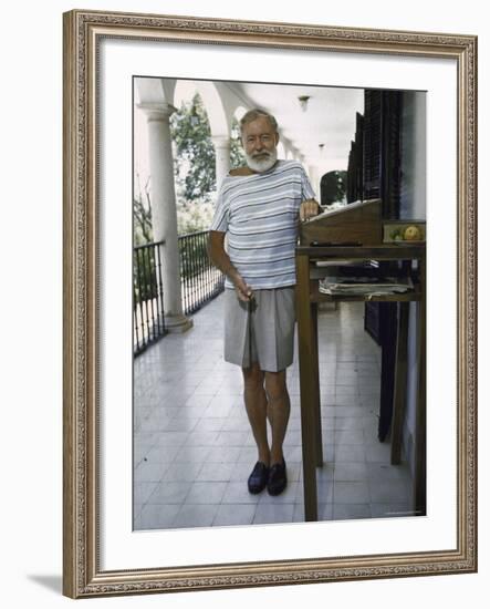 Ernest Hemingway on the Balcony of Bill Davis's Home Near Malaga-Loomis Dean-Framed Premium Photographic Print