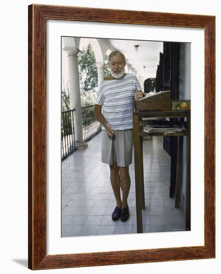 Ernest Hemingway on the Balcony of Bill Davis's Home Near Malaga-Loomis Dean-Framed Premium Photographic Print