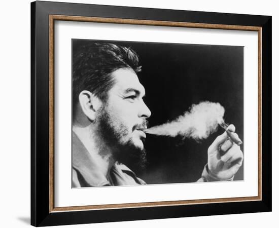 Ernesto 'Che' Guevara Exhaling Plume of Cigar, NYC, 1964-null-Framed Photo