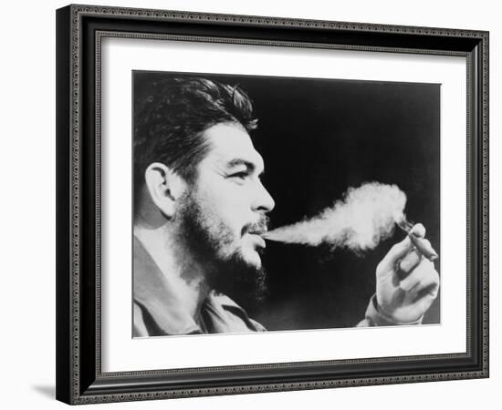 Ernesto 'Che' Guevara Exhaling Plume of Cigar, NYC, 1964-null-Framed Photo