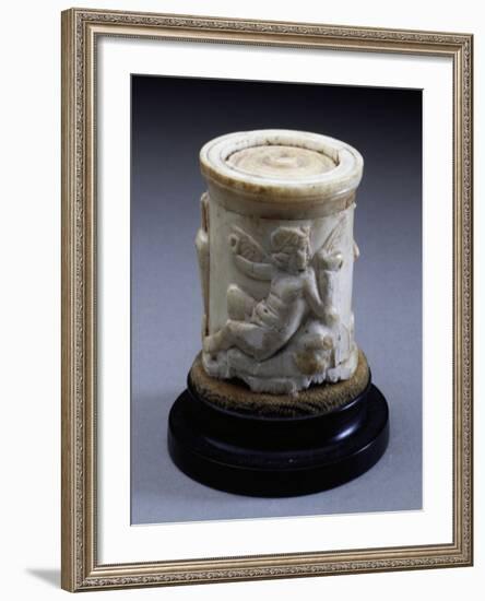 Eros Playing Flute Sitting on Rock-null-Framed Giclee Print