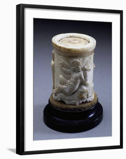 Eros Playing Flute Sitting on Rock-null-Framed Giclee Print