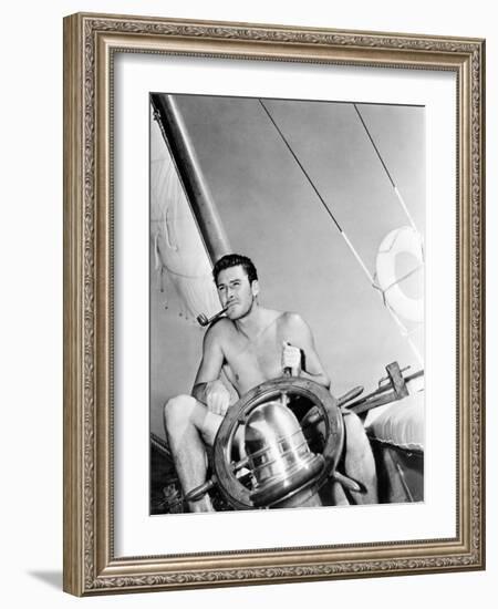 Errol Flynn Relaxing on His Yacht, October 20, 1937-null-Framed Photo