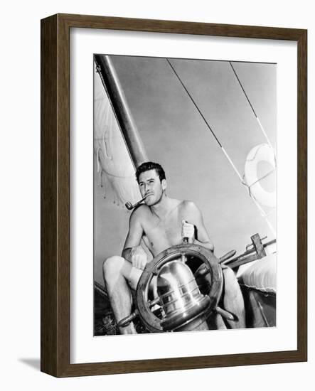 Errol Flynn Relaxing on His Yacht, October 20, 1937-null-Framed Photo