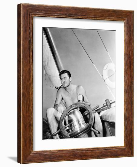 Errol Flynn Relaxing on His Yacht, October 20, 1937-null-Framed Photo