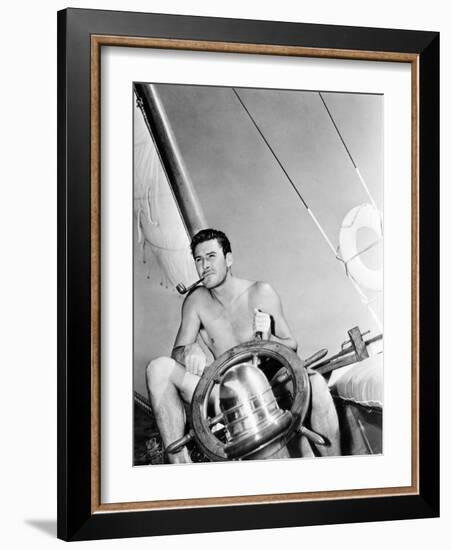 Errol Flynn Relaxing on His Yacht, October 20, 1937-null-Framed Photo