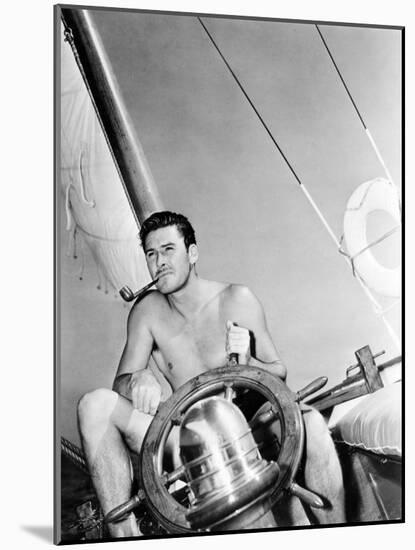 Errol Flynn Relaxing on His Yacht, October 20, 1937-null-Mounted Photo