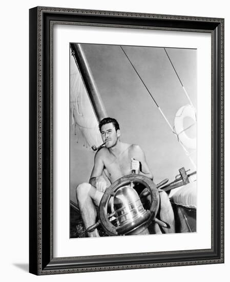 Errol Flynn Relaxing on His Yacht, October 20, 1937-null-Framed Photo