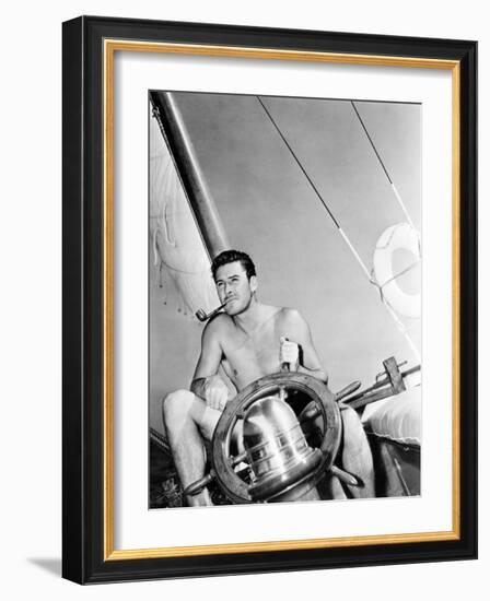 Errol Flynn Relaxing on His Yacht, October 20, 1937-null-Framed Photo