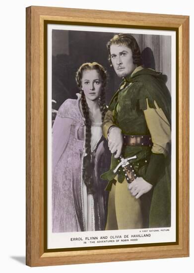 Erroll Flynn as Robin and Olivia de Havilland as Maid Marian in "The Adventures of Robin Hood" 1938-null-Framed Stretched Canvas