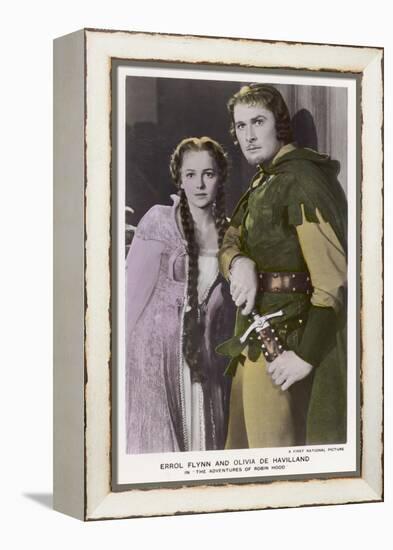Erroll Flynn as Robin and Olivia de Havilland as Maid Marian in "The Adventures of Robin Hood" 1938-null-Framed Stretched Canvas