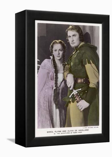 Erroll Flynn as Robin and Olivia de Havilland as Maid Marian in "The Adventures of Robin Hood" 1938-null-Framed Stretched Canvas