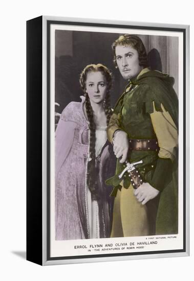 Erroll Flynn as Robin and Olivia de Havilland as Maid Marian in "The Adventures of Robin Hood" 1938-null-Framed Stretched Canvas