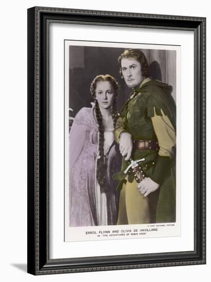 Erroll Flynn as Robin and Olivia de Havilland as Maid Marian in "The Adventures of Robin Hood" 1938-null-Framed Premium Giclee Print