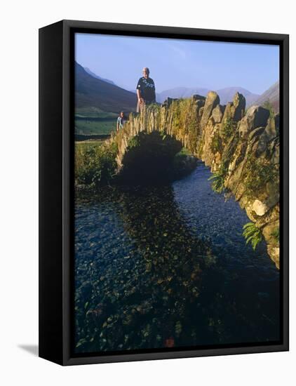 Eskdale, Cumbria, Walkers Crossiing a Tradition Stone Bridge-Paul Harris-Framed Premier Image Canvas