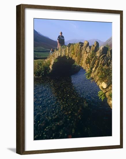 Eskdale, Cumbria, Walkers Crossiing a Tradition Stone Bridge-Paul Harris-Framed Photographic Print