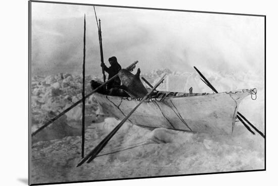Eskimo in Boat made with Skins called an Omiak Photograph - Alaska-Lantern Press-Mounted Art Print
