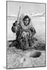 Eskimo Woman Fishing through Ice in Alaska Photograph - Alaska-Lantern Press-Mounted Art Print
