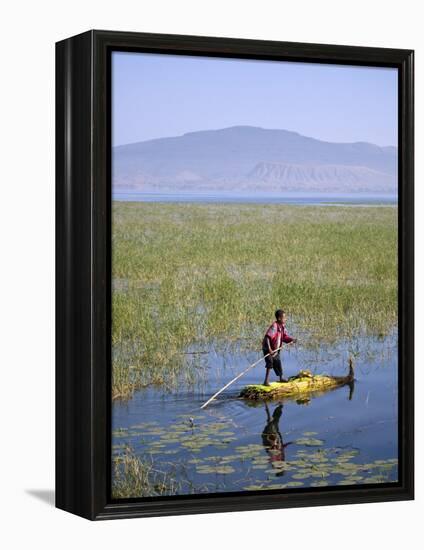 Ethiopia, Lake Awassa; a Young Boy Punts a Traditional Reed Tankwa Through the Reeds-Niels Van Gijn-Framed Premier Image Canvas